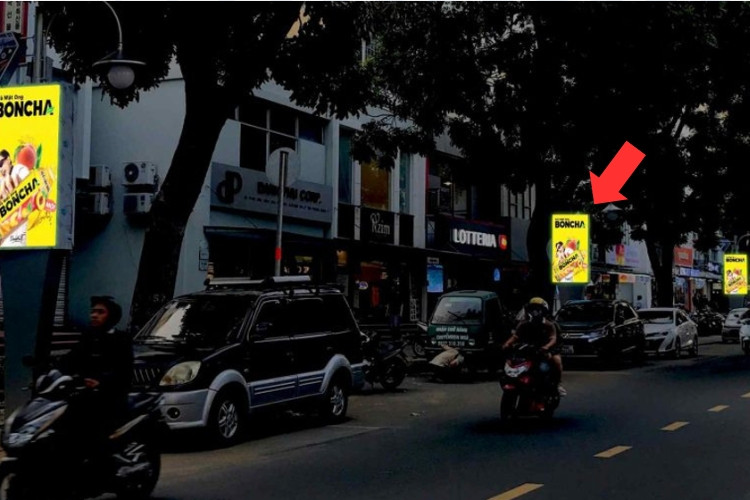 Night view - Vertical LED Column Cladding Billboard at Pham Van Nghi Street, Tan Hung Ward, Ho Chi Minh City (Sky Garden Apartment Food Street)