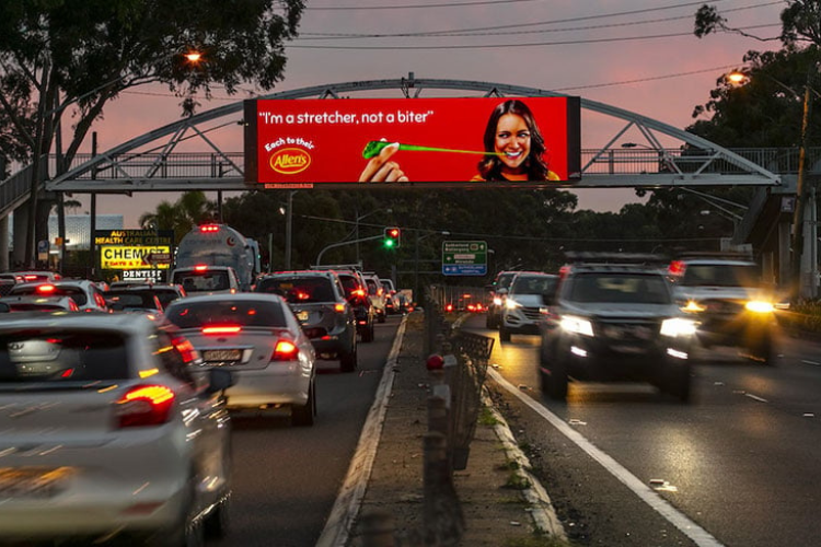 Who provides high-impact roadside advertising solutions for small businesses?